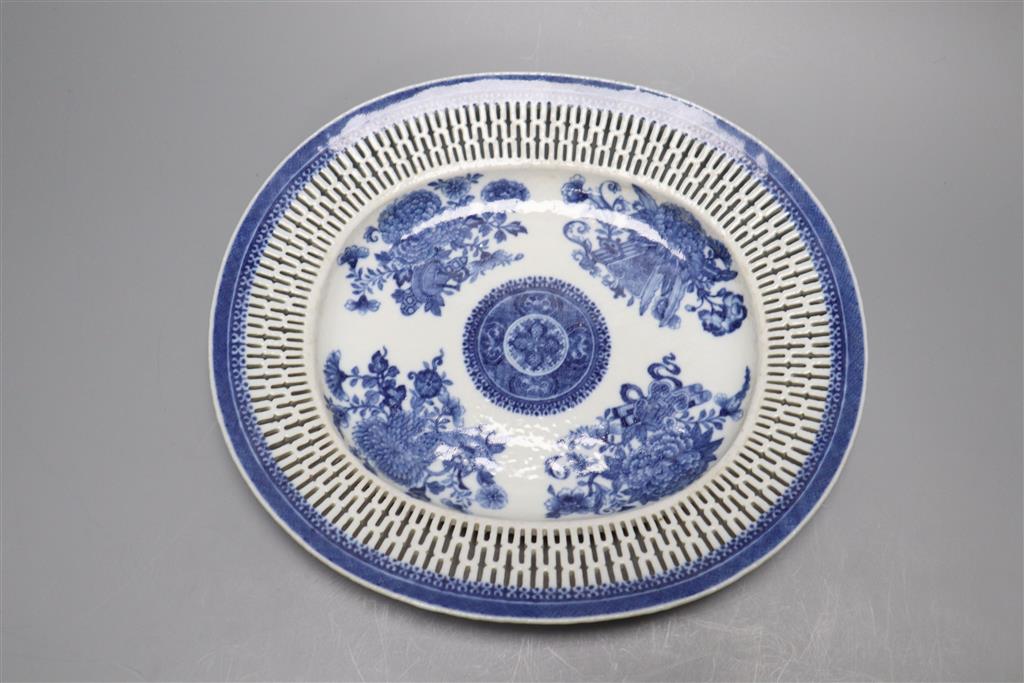 An 18th century Chinese export blue and white basket (cracked) and stand and a Cantonese dish